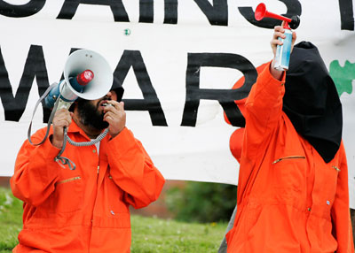 Anti-war demonstrators protest outside Trimdon Labour Club during a visit by Britain's Prime Minister Tony Blair in Trimdon, northeast England May 10, 2007. 